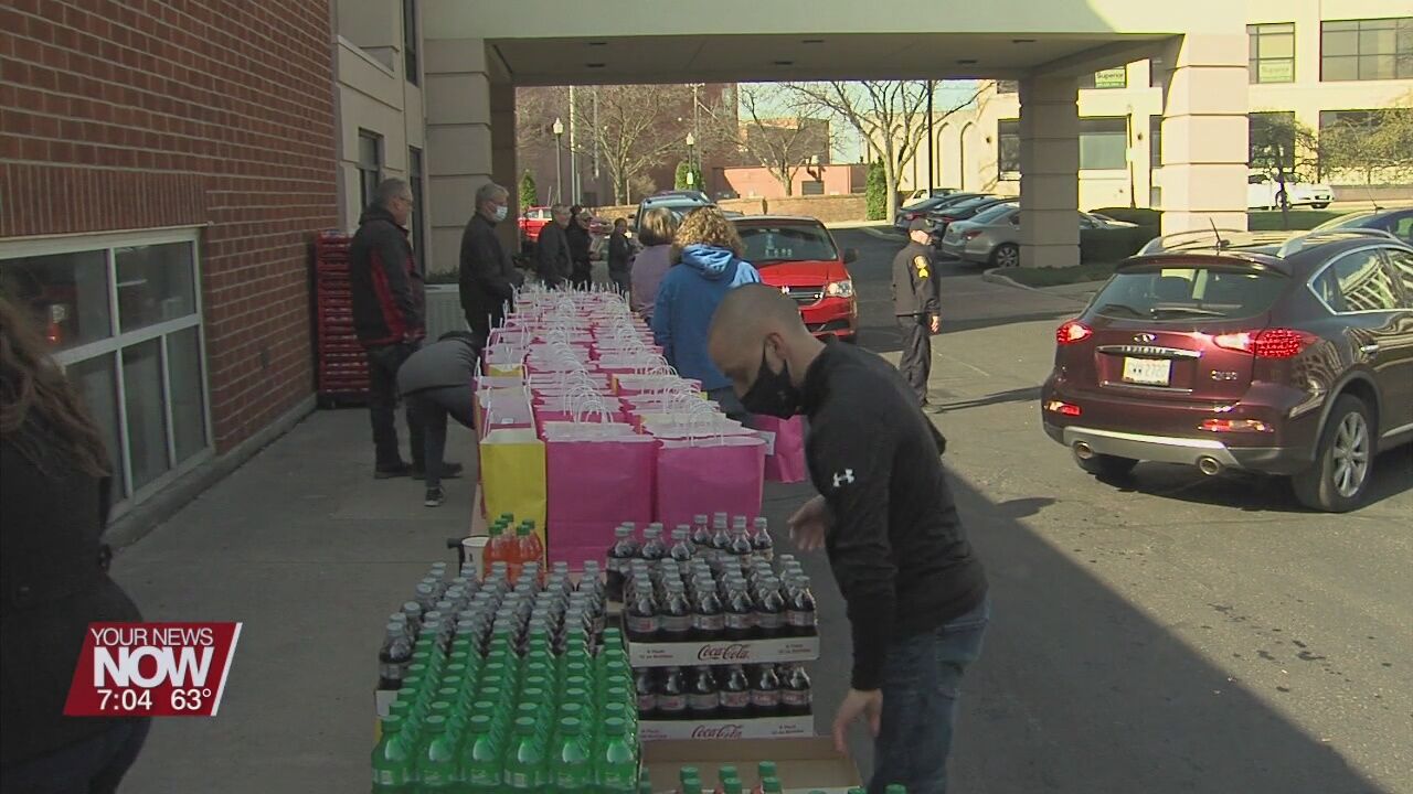 Tom Ahl Dealership holds drive-thru Easter dinners
